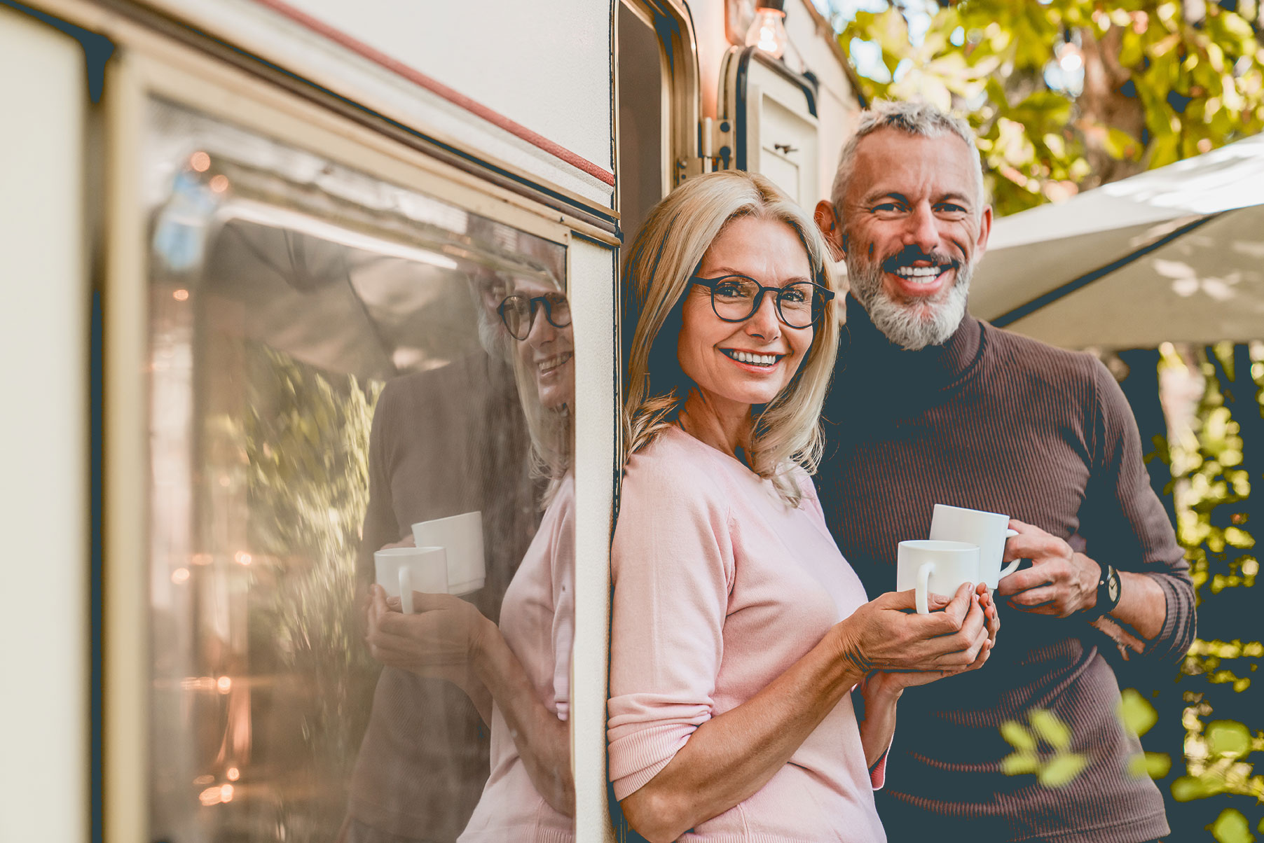 A pediatric dental patient with ClearCorrect aligners smiles happily outdoors on a sunny day.